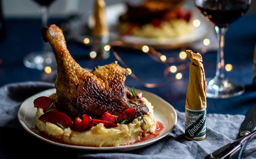 GOOSE LEGS WITH MASHED POTATOES AND UNDERBERG PLUMS