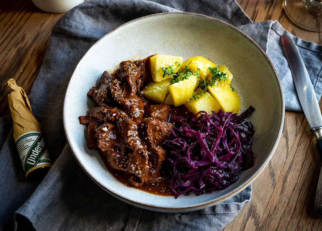 WILD BOAR GOULASH WITH POTATOES AND RED CABBAGE